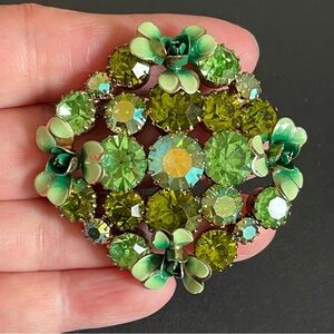 Vintage Karu Arke green rhinestone & color enamel brooch.
